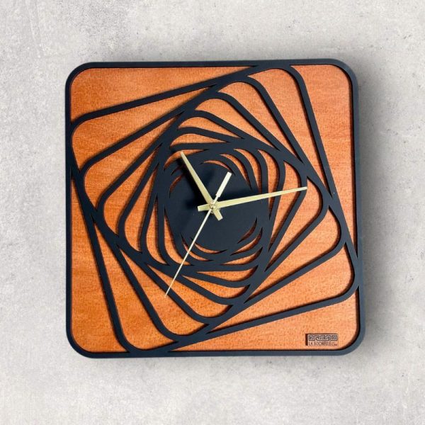 reloj de pared artesanal Susurro con motivo geométrico